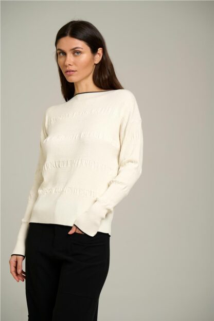 Jersey crema con detalles